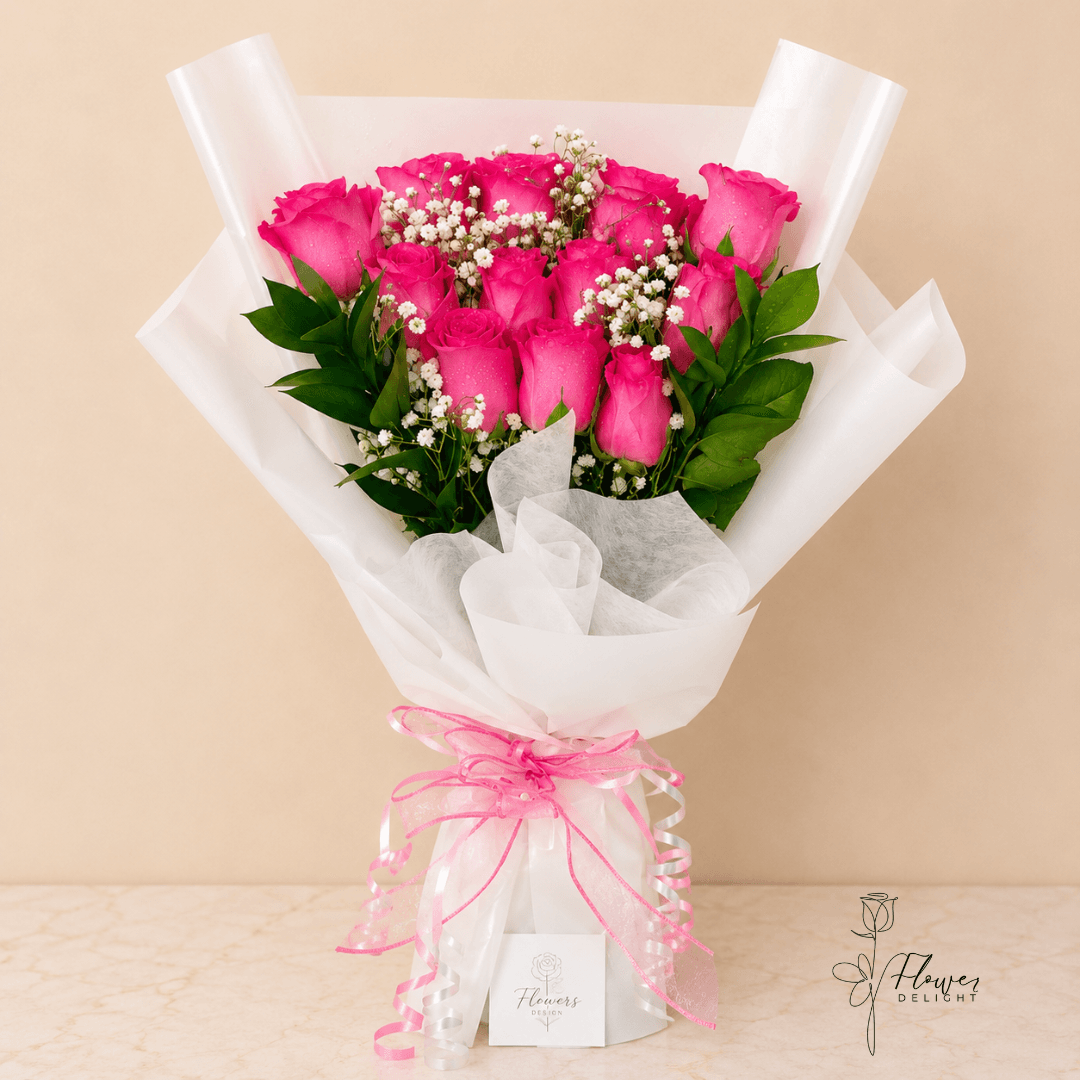 12 Pink Roses with White Wrapping by Flower Delight
