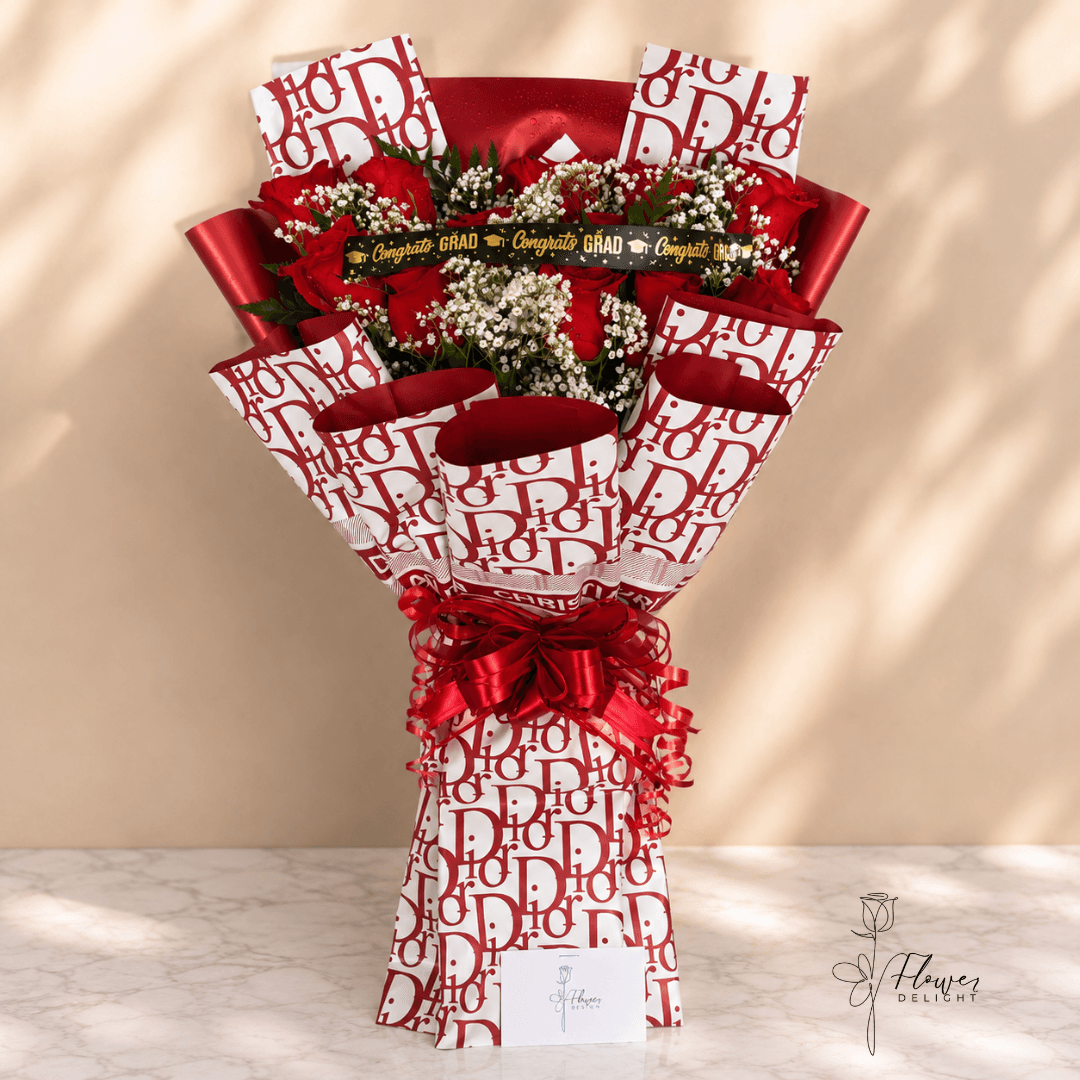 12 Red Roses with Red Dior Wrapping by Flower Delight