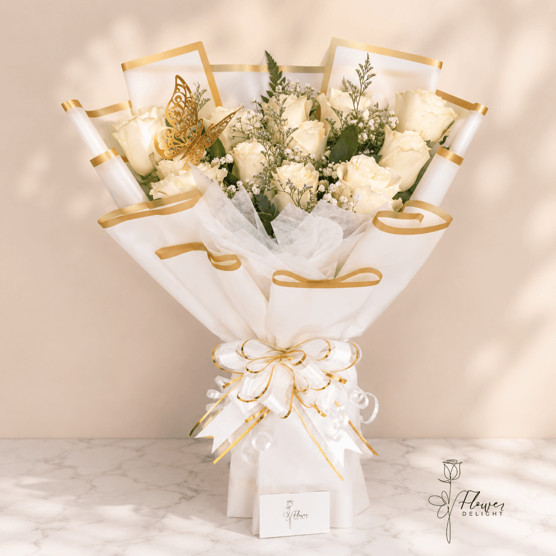 12 White Roses with White Wrapping by Flower Delight