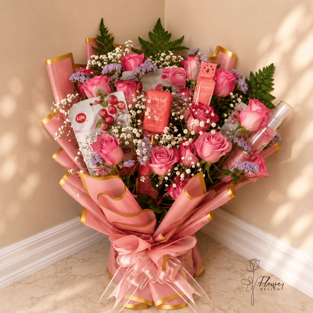 18 Pink Roses and Gift Accent with Pink Wrapping by Flower Delight