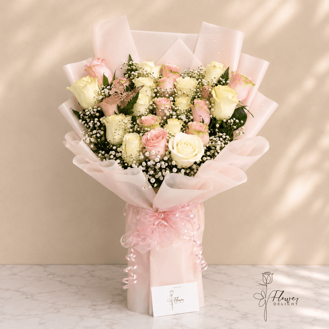 24 Pink and White Roses with Pink Wrapping by Flower Delight