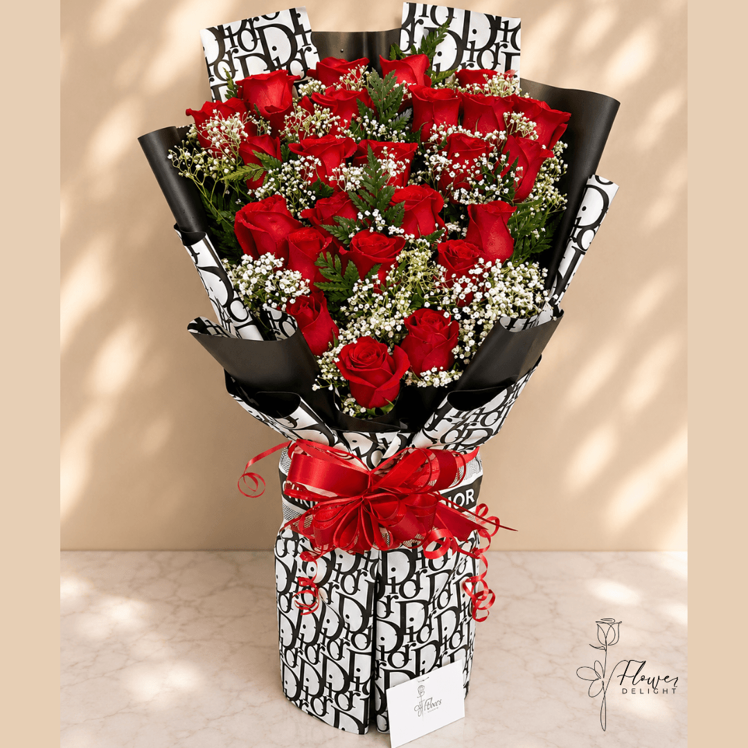 24 Red Roses with Black Dior Wrapping by Flower Delight