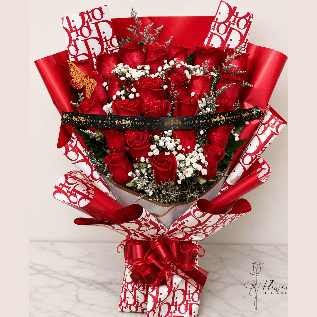 24 Red Roses with Red Dior Wrapping by Flower Delight