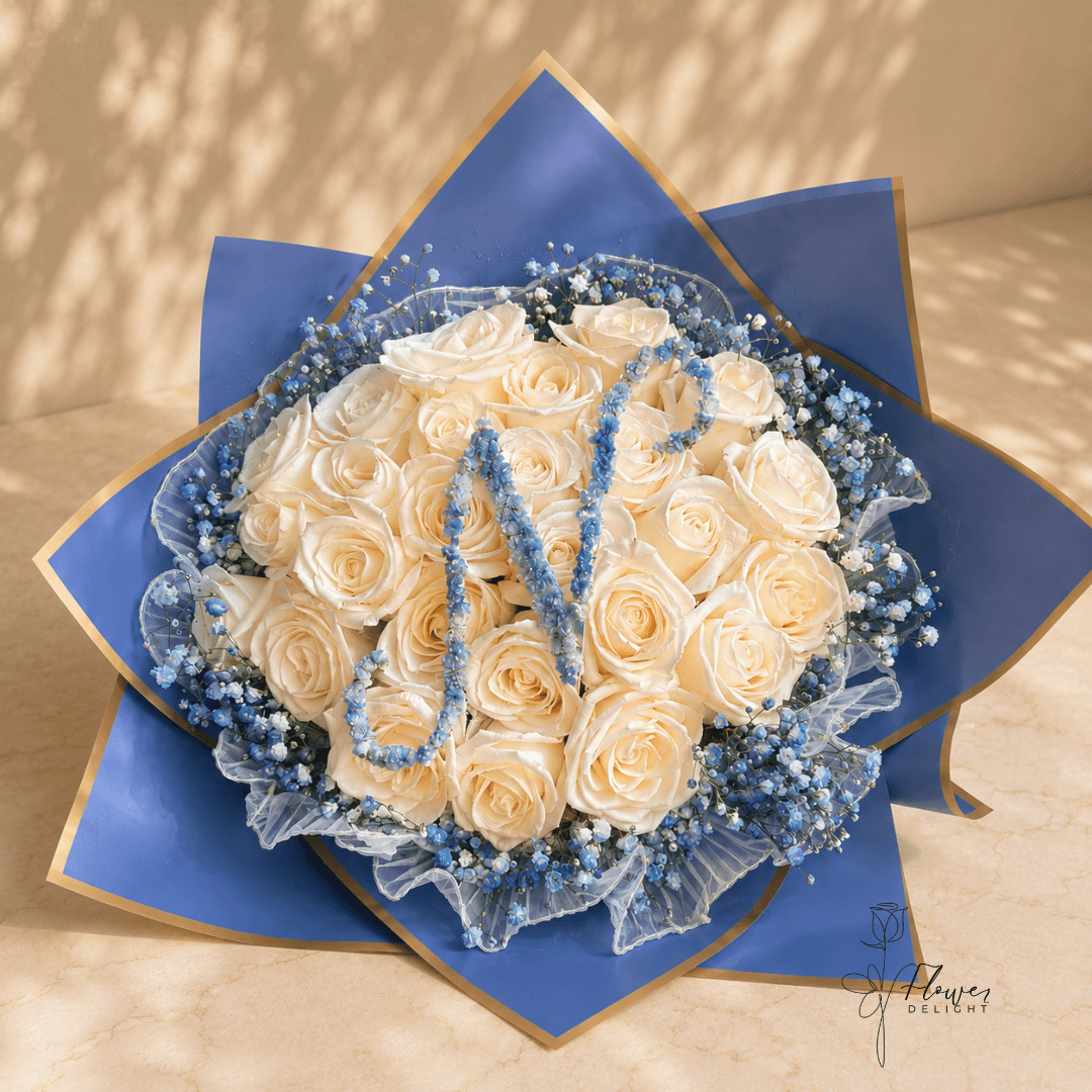 24 White Roses with Blue Wrapping by Flower Delight