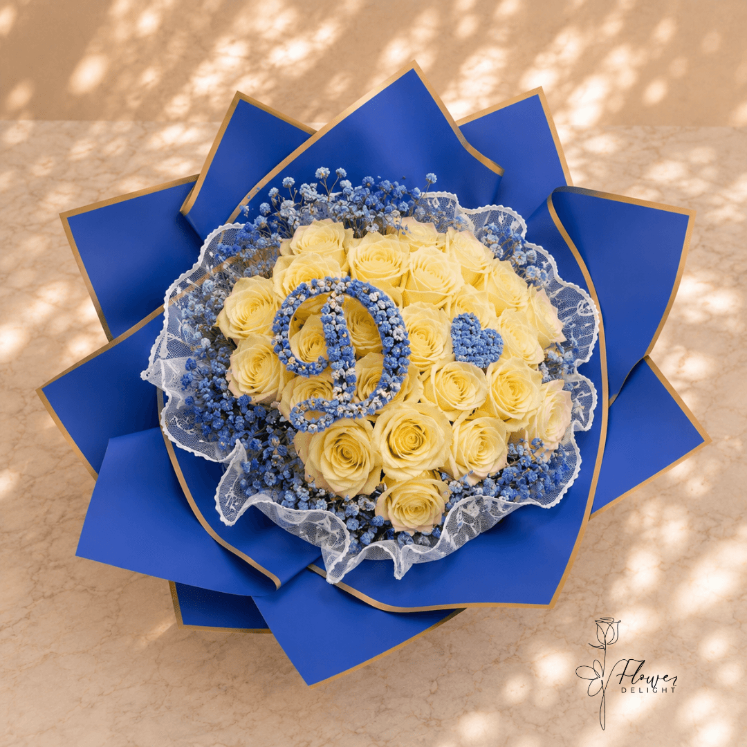 24 White Roses with Dark Blue Wrapping by Flower Delight
