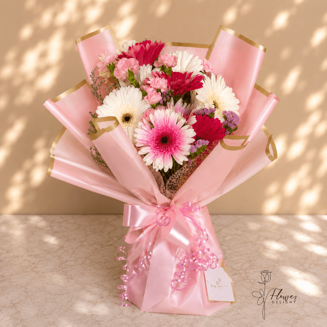 Mixed Gerbera with Pink Wrapping by Flower Delight