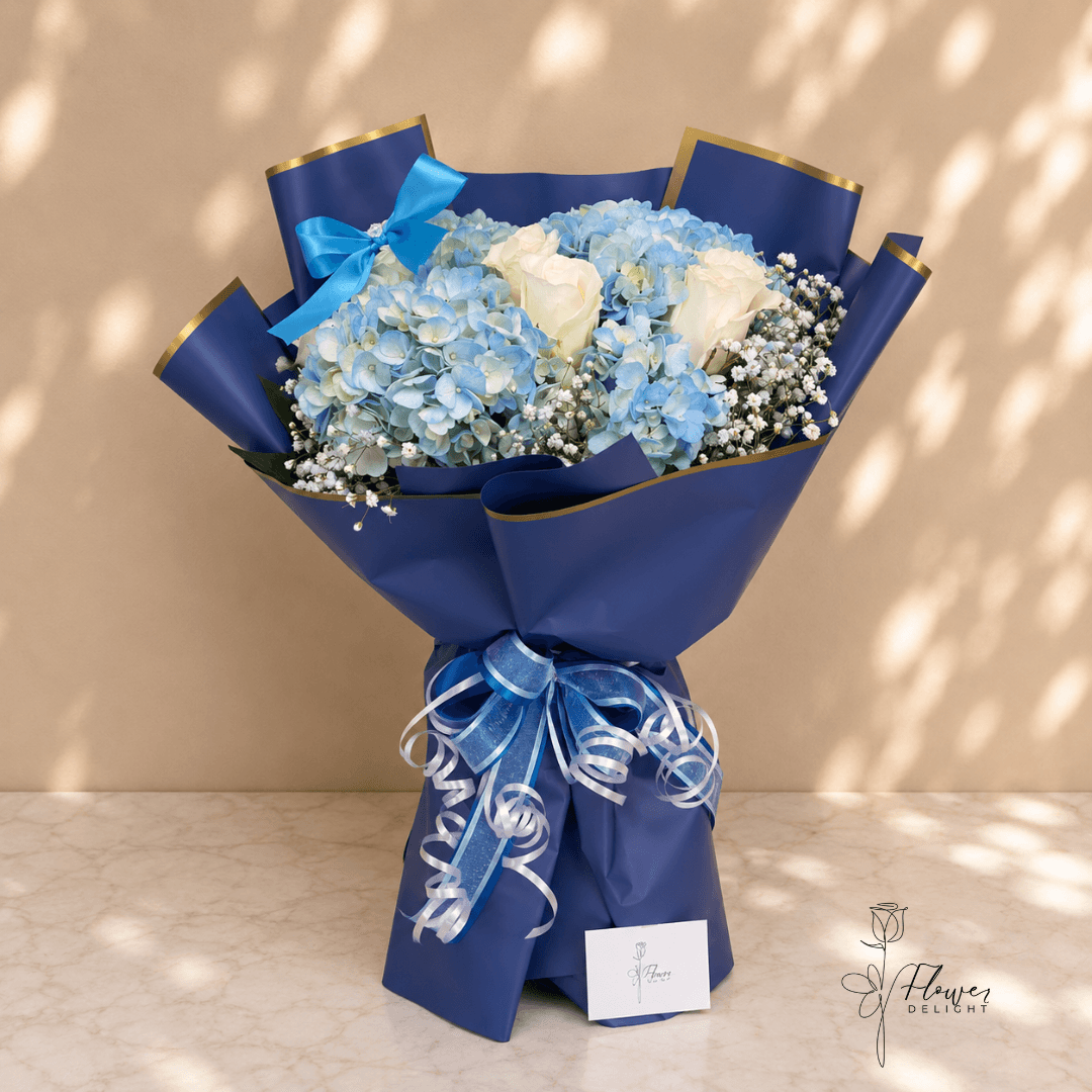 Hydrangea and white rose bouquet by Flower Delight