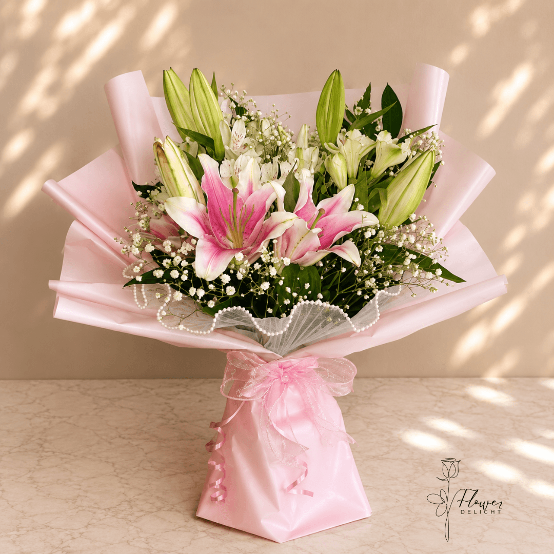 Pink Lilies with Pink Wrapping and Beaded Skirt by Flower Delight